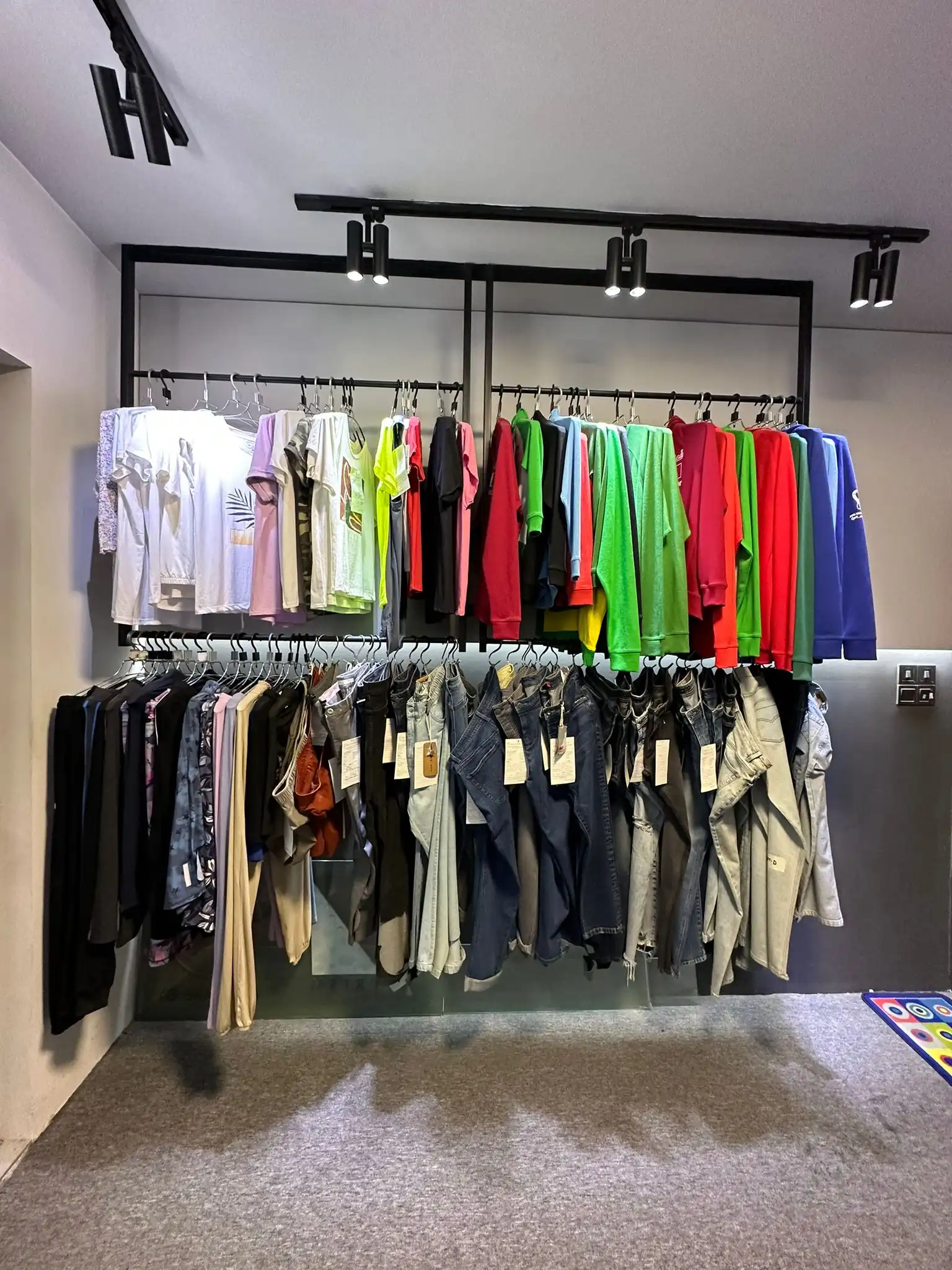 Showroom rail of knit and woven samples