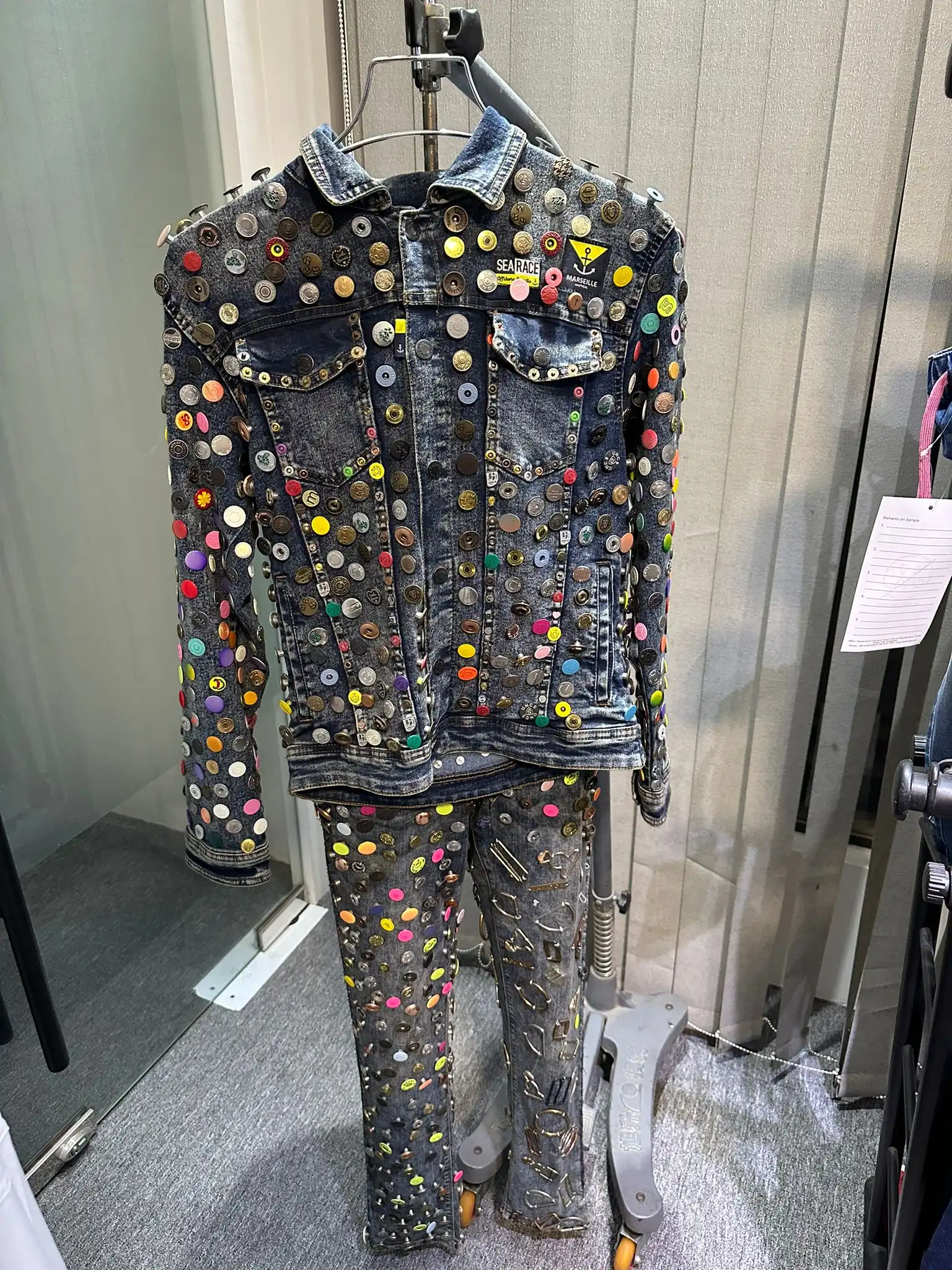 Embellished garment sample on display