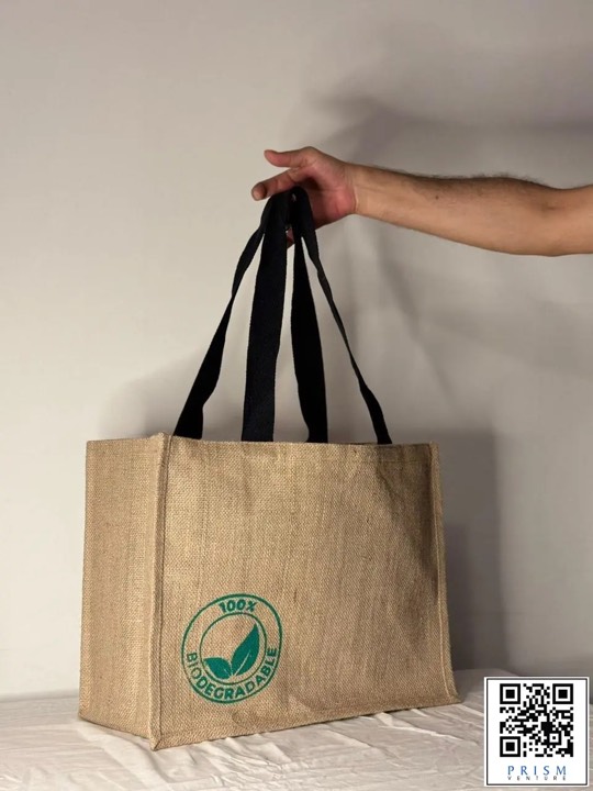 Jute shopping bag held by hand